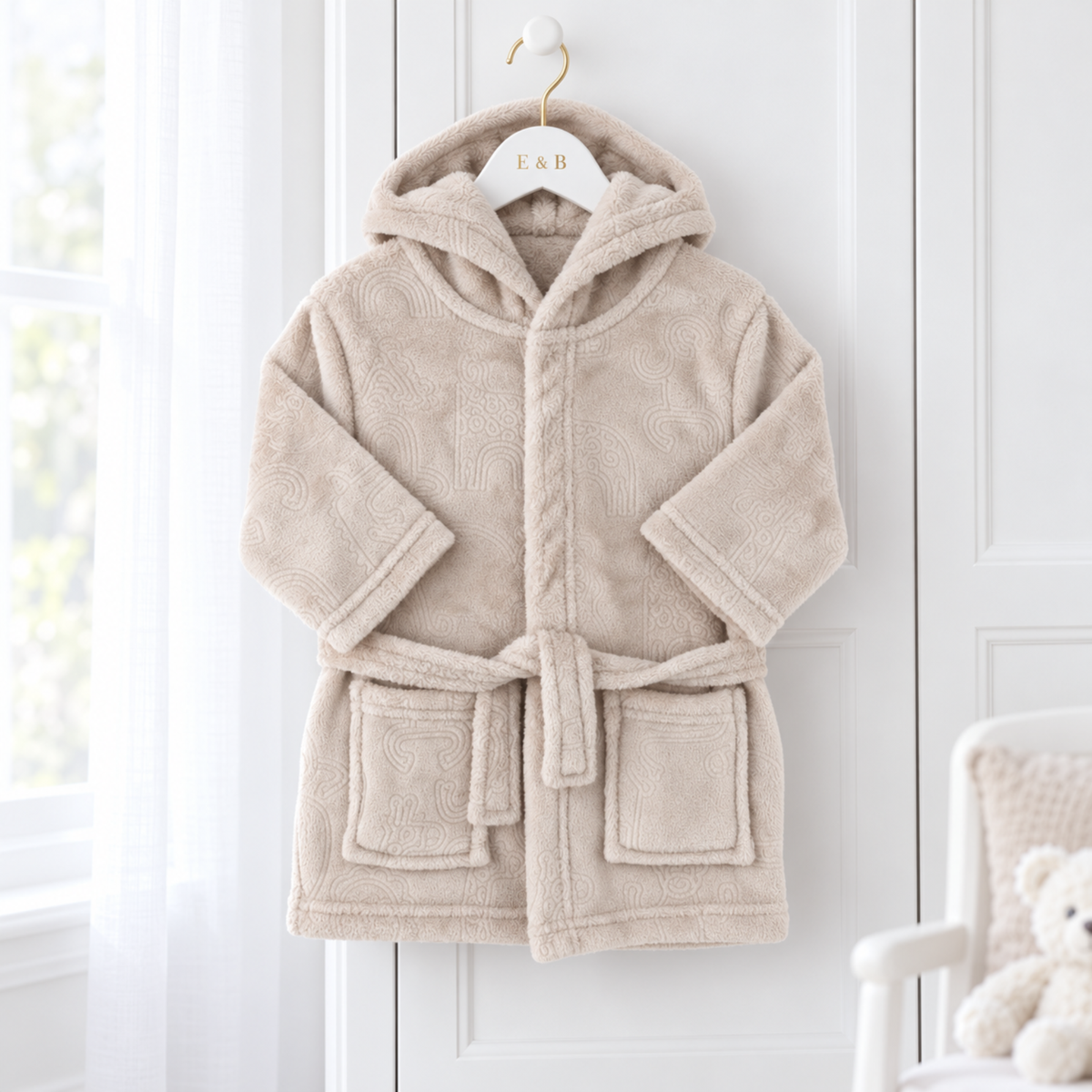 Biscuit beige hooded baby dressing gown with embossed animal and rainbow design, two front pockets and matching waist belt