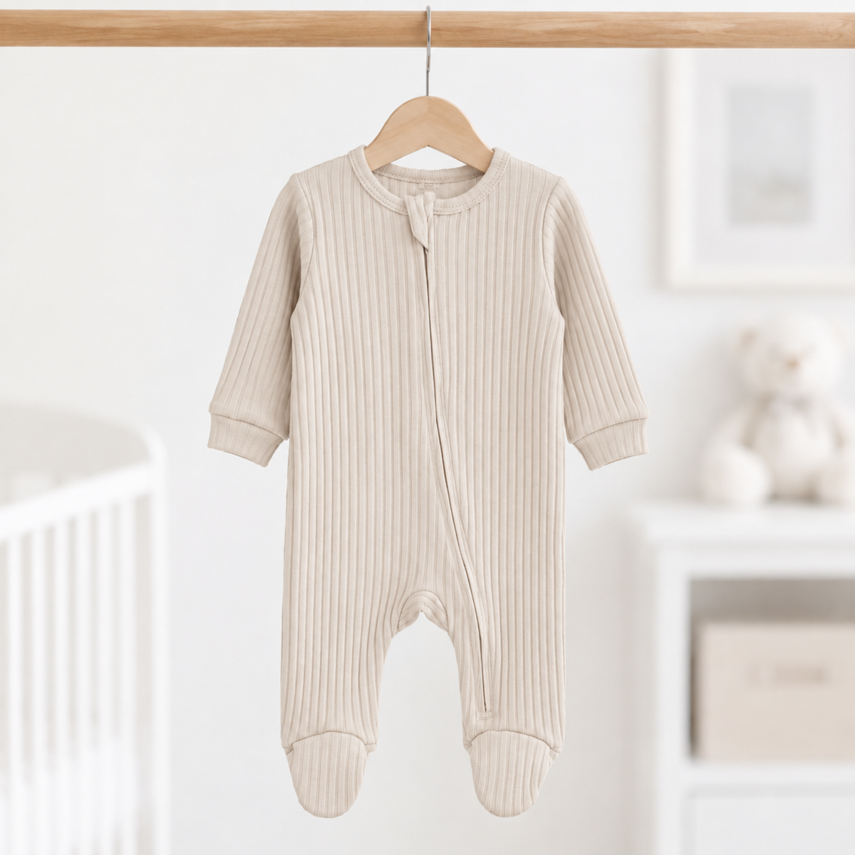 Biscuit ribbed cotton baby sleepsuit in neutral colour 0–3 months