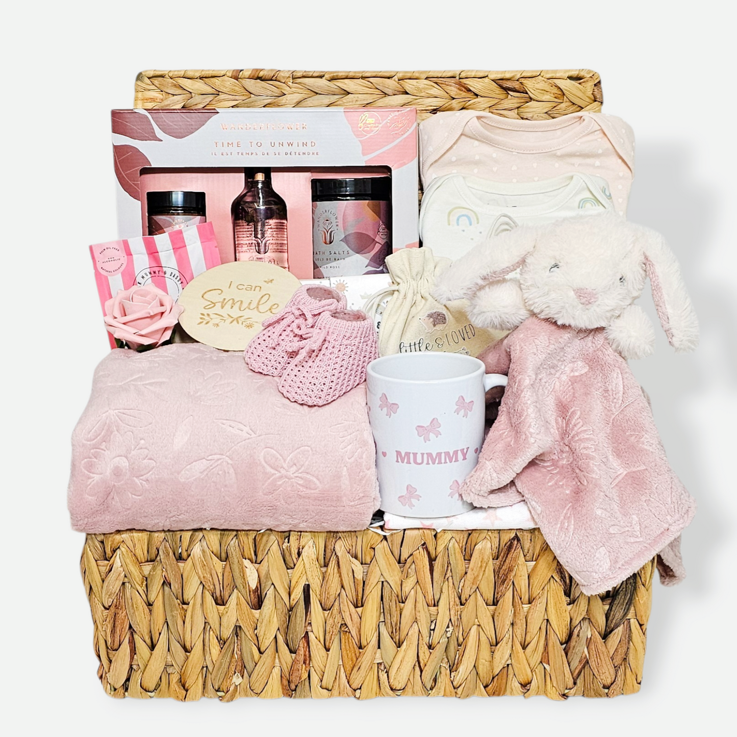 Mum and baby gift hamper with pampering treats and baby essentials