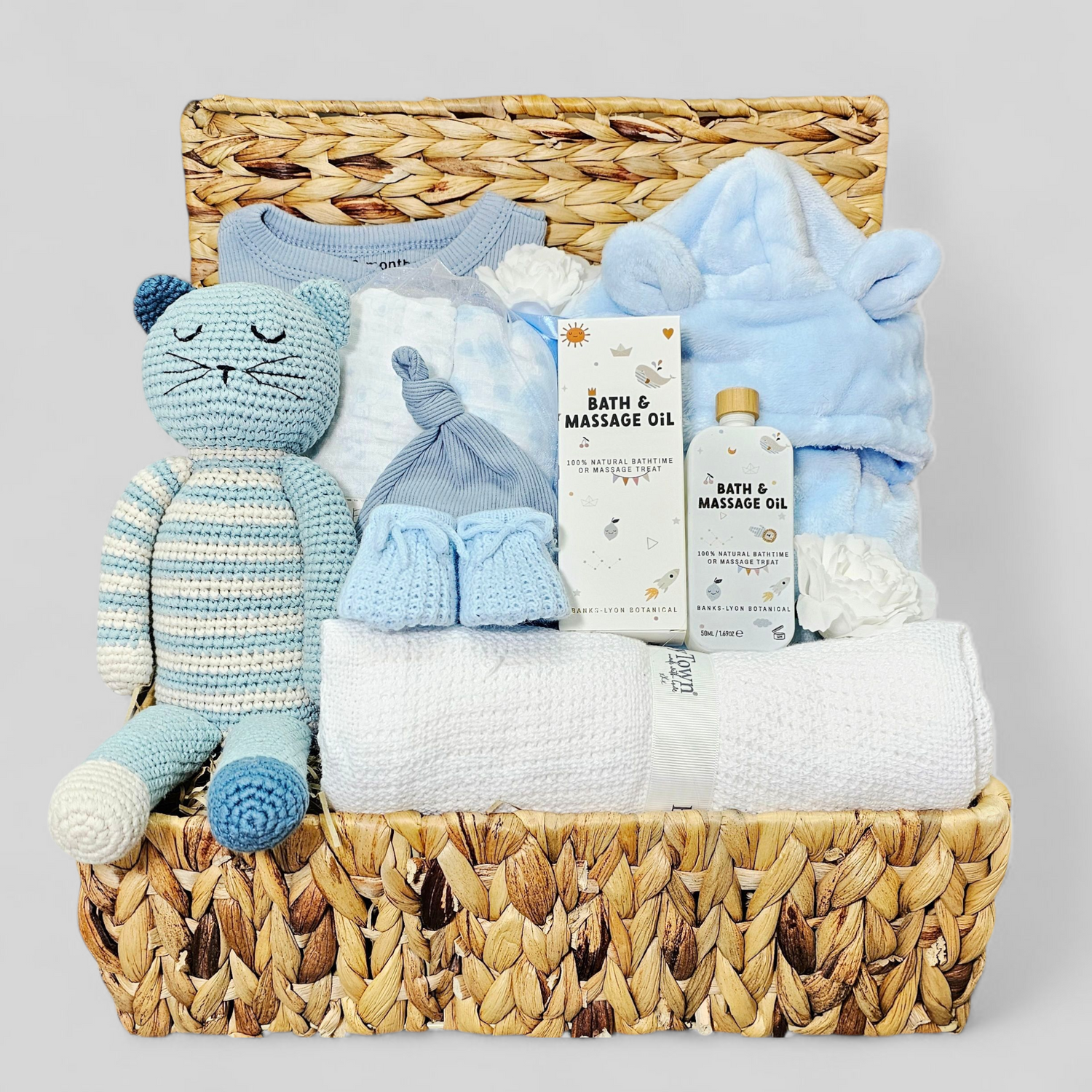 Luxury baby boy hamper filled with soft blue baby gifts and keepsakes -packed in London, perfect for newborn or baby shower gifting.