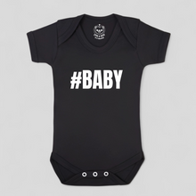 Load image into Gallery viewer, #BABY black and white MonoCub baby bodysuit – modern unisex newborn gift.

