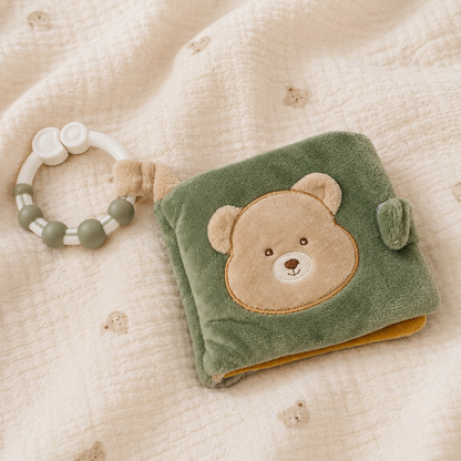 A soft baby sensory book with a bear face  - Baby Toys