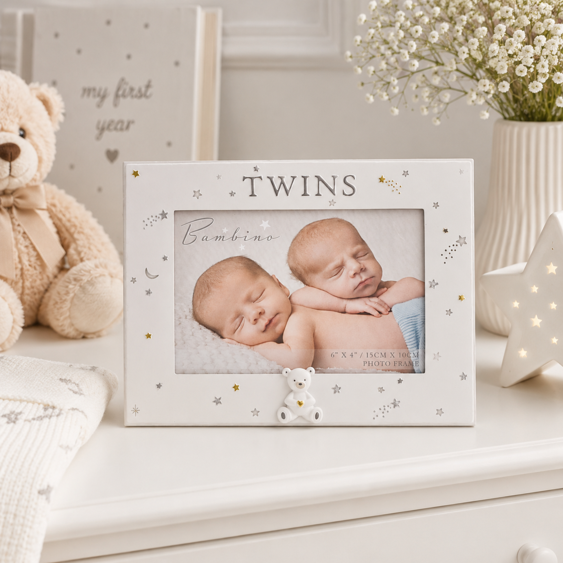 White Bambino twins photo frame with teddy bear detail, holding a 6x4 newborn twins photograph, perfect as a keepsake gift for parents of twins.