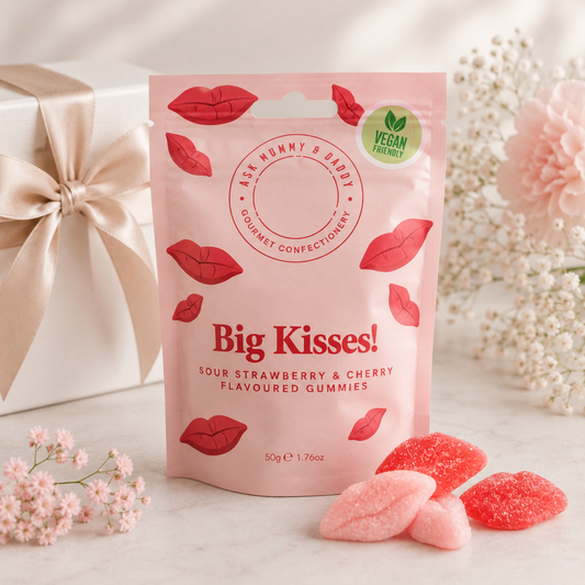 Vegan strawberry and cherry sour gummy lips in pink pouch – ideal new parent treat and baby hamper add-on.