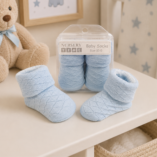 Blue newborn baby socks with diamond design in gift box