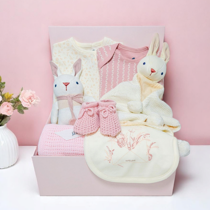 Blush Bunny Baby Girl Gift Hamper – pink newborn hamper with baby clothes, blanket, plush bunny toy, and comforter in keepsake box
