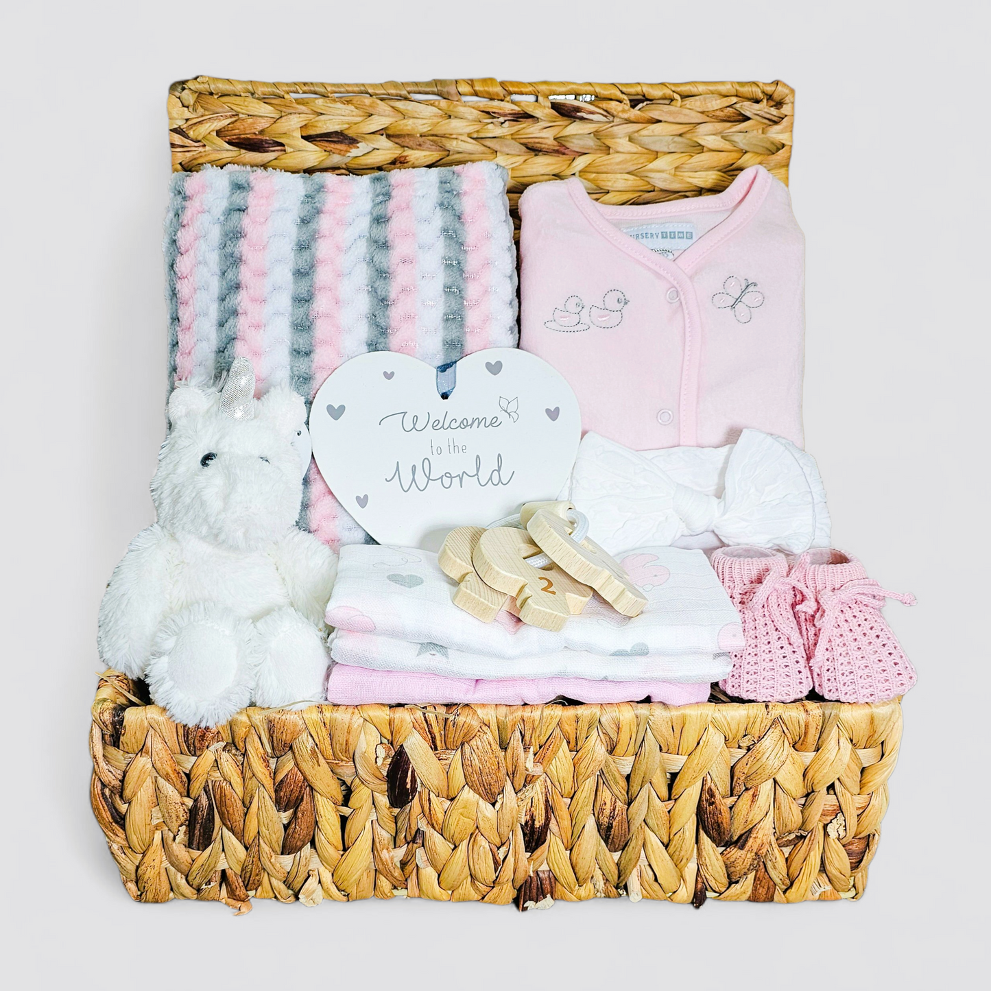 Luxury baby girl hamper in water hyacinth basket – Ema and Boo