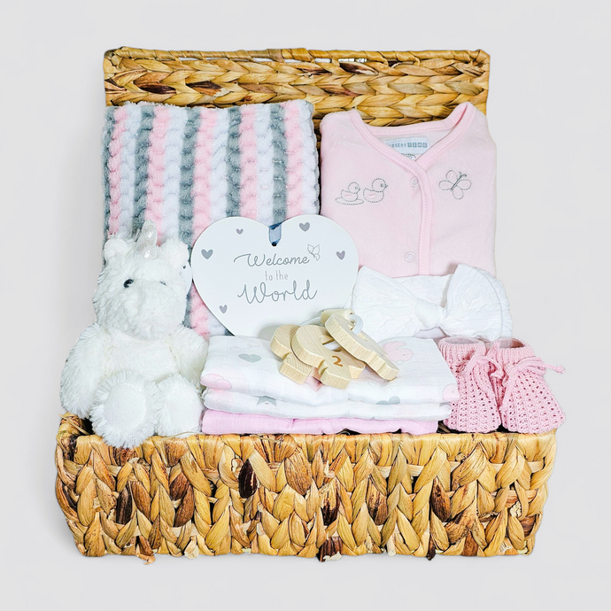 Luxury baby girl hamper in water hyacinth basket – Ema and Boo