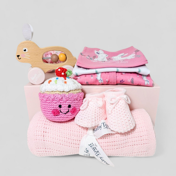 Cotton Cloud Baby Girl Gift Hamper – pink baby outfit, blanket, fairtrade cupcake rattle, bunny toy, and booties in luxury gift box