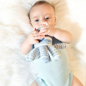 Cute Baby Boy Playing With Rattle