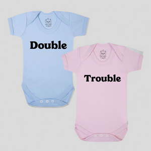 Pink & blue Double Trouble twin baby bodysuit set