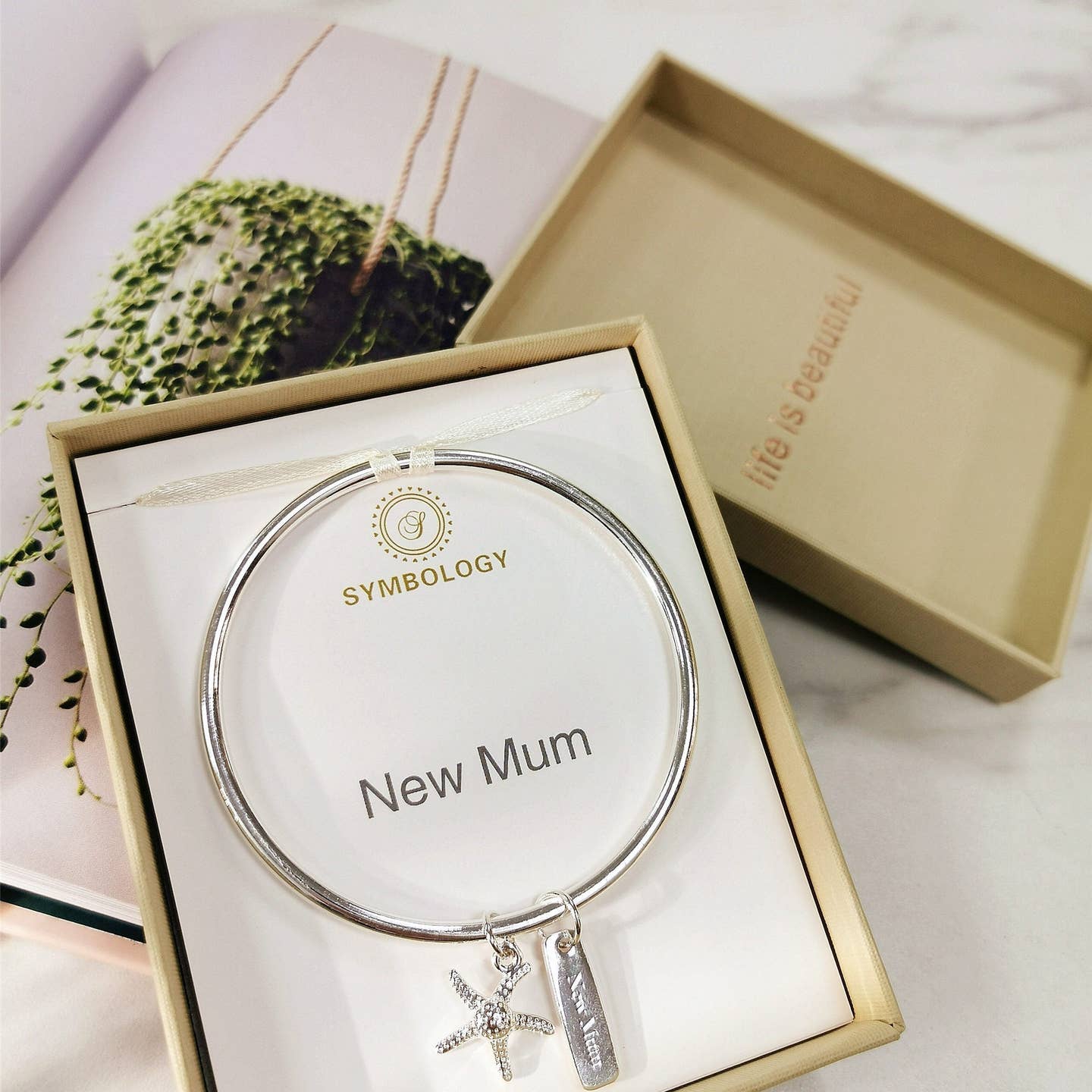 Silver plated New Mum bangle with starfish charm