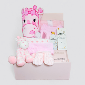 Pink giraffe-themed baby hamper with clothes, blanket & rattle