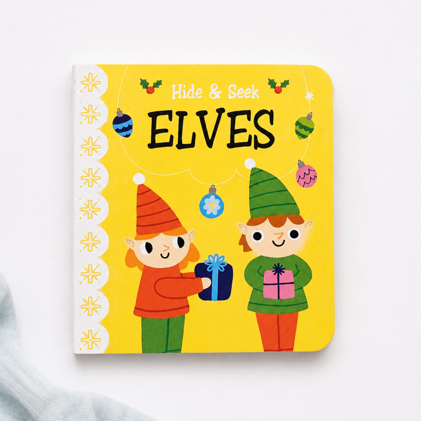Hide & Seek Elves mini Christmas baby book with colourful elves and presents