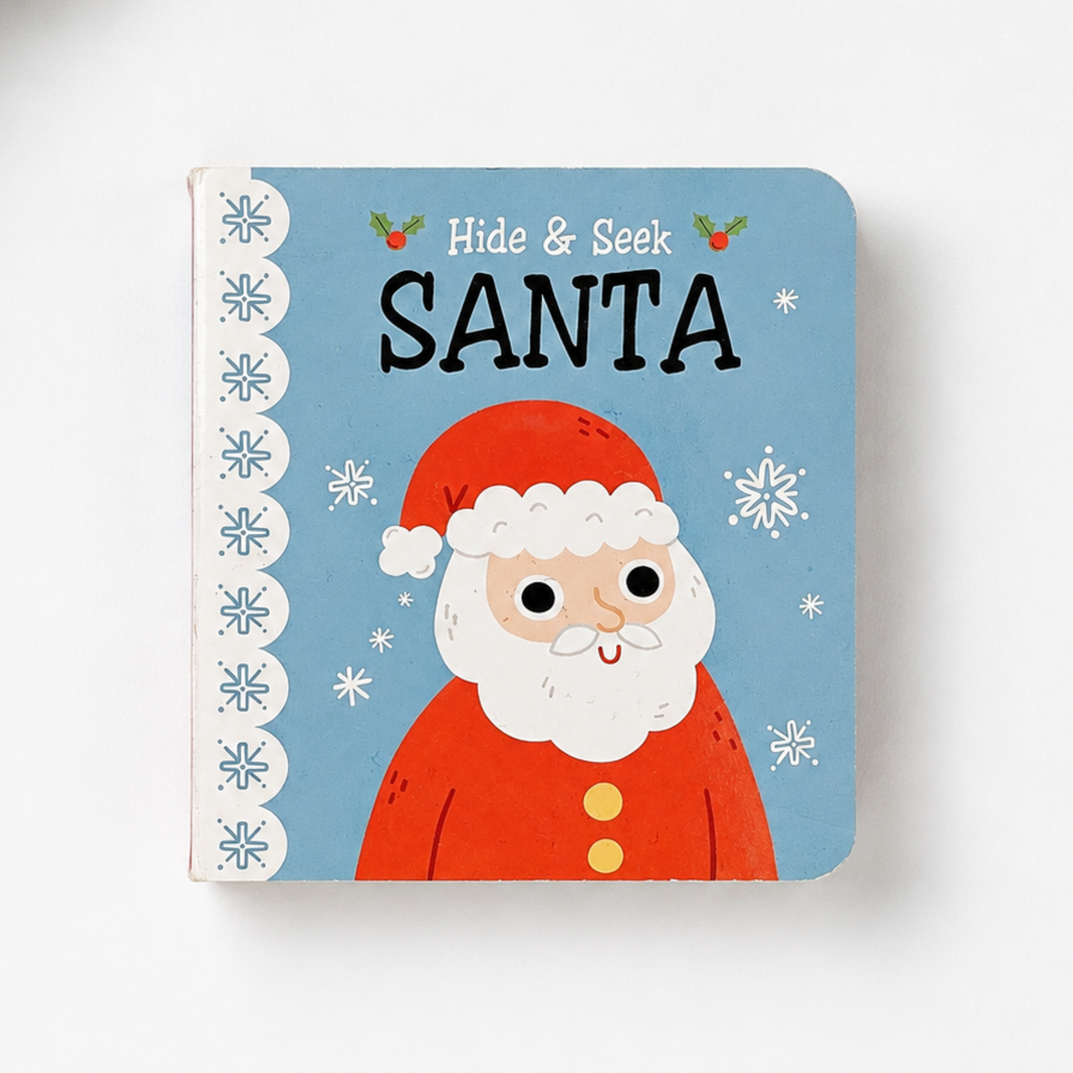 Hide & Seek Santa mini Christmas baby book with colourful Father Christmas illustration