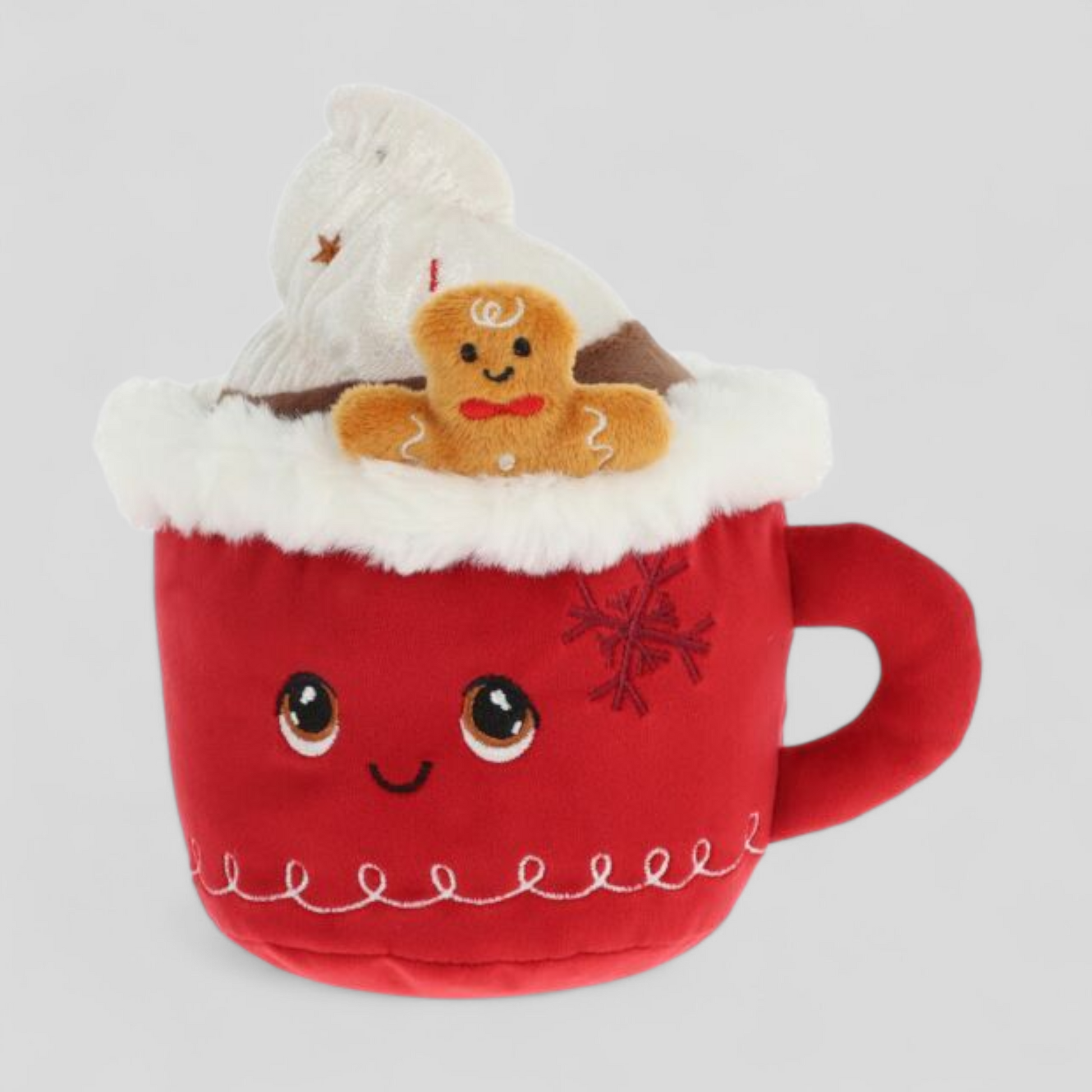 Red plush mug with a smiling face, white fluffy top, and gingerbread man 