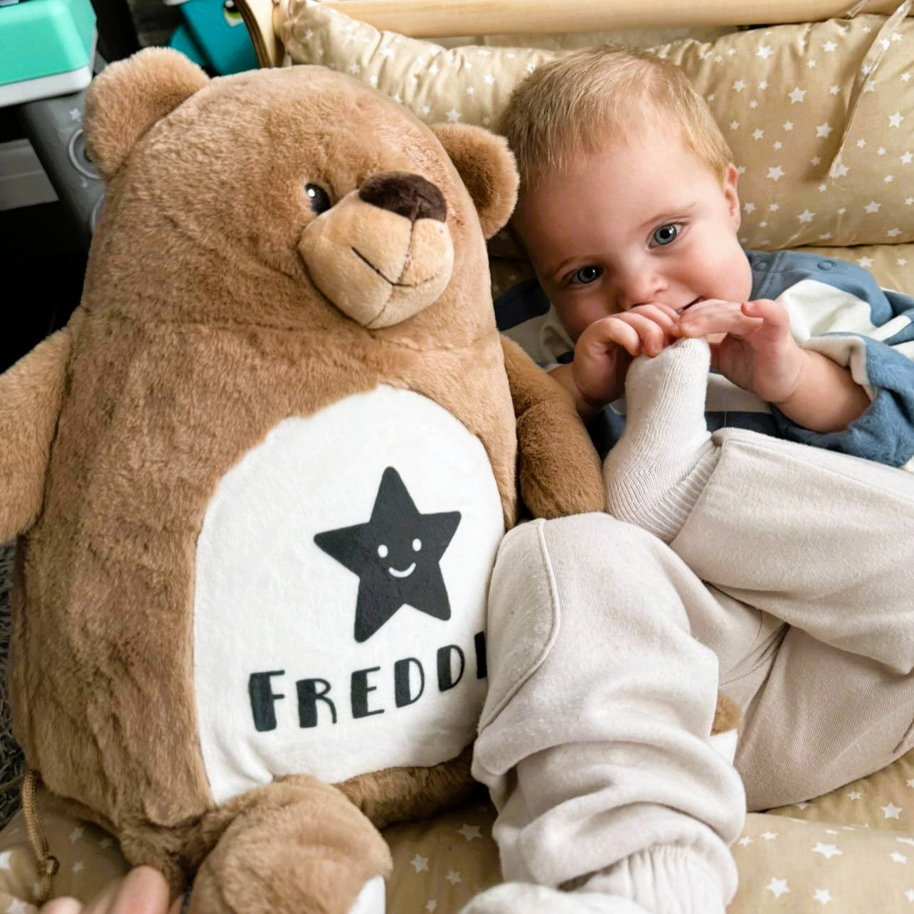 Personalised large bear plush toy with baby name, brown teddy with star detail in nursery