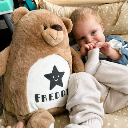 Personalised large bear plush toy with baby name, brown teddy with star detail in nursery