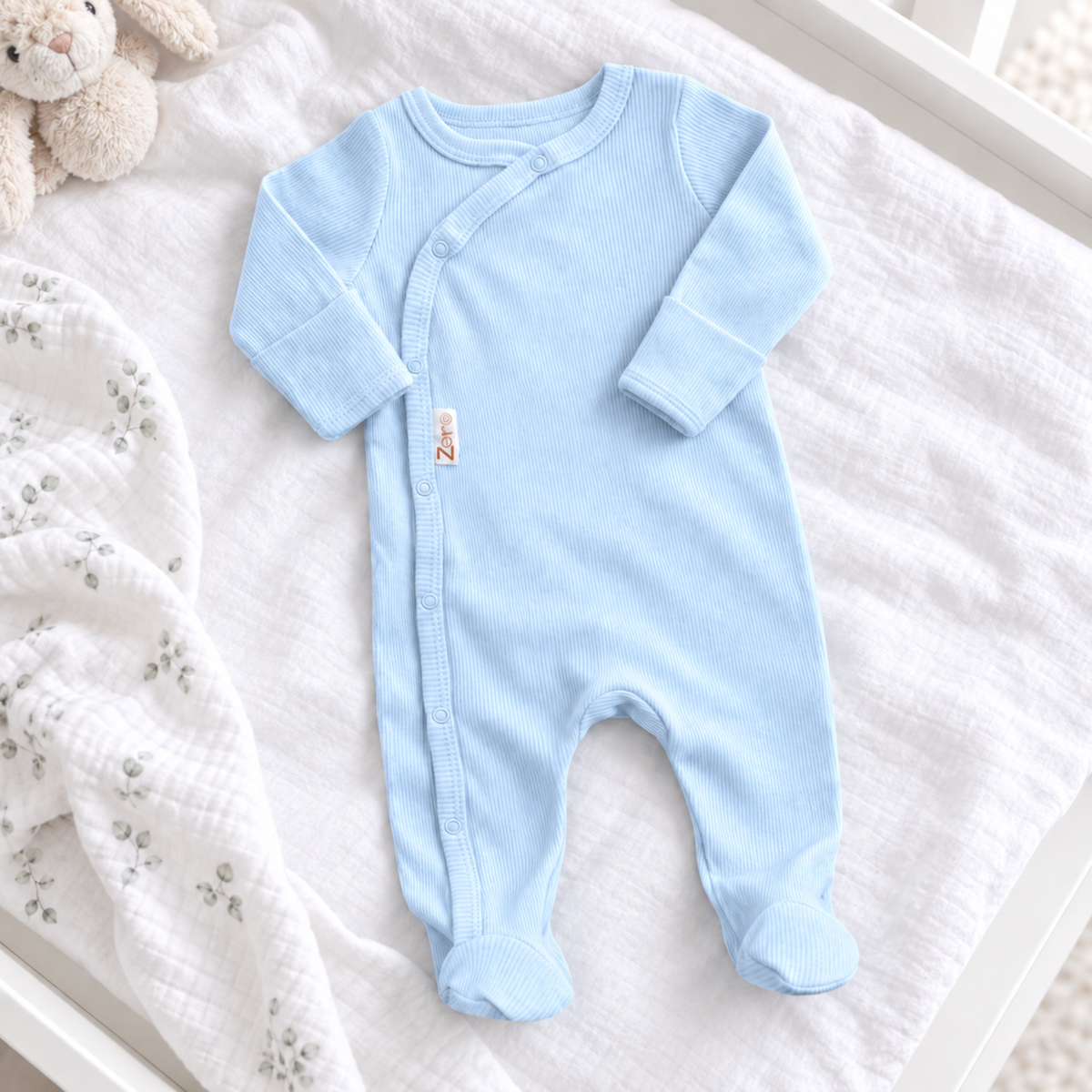 Light blue ribbed baby boy sleepsuit with popper fastening