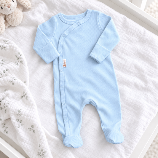 Light blue ribbed baby boy sleepsuit with popper fastening