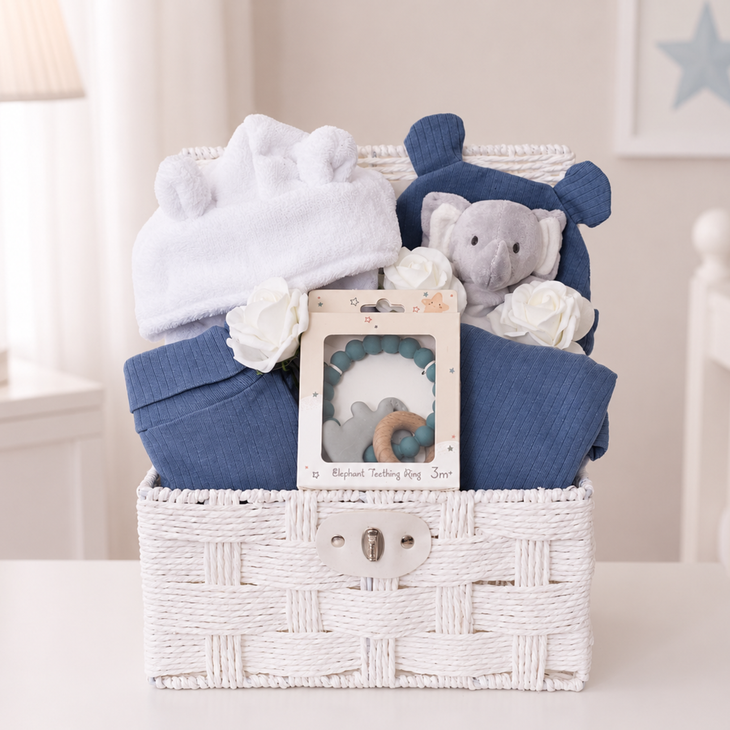 Luxury baby boy gift hamper with organic cotton baby clothes by Ema and Boo.