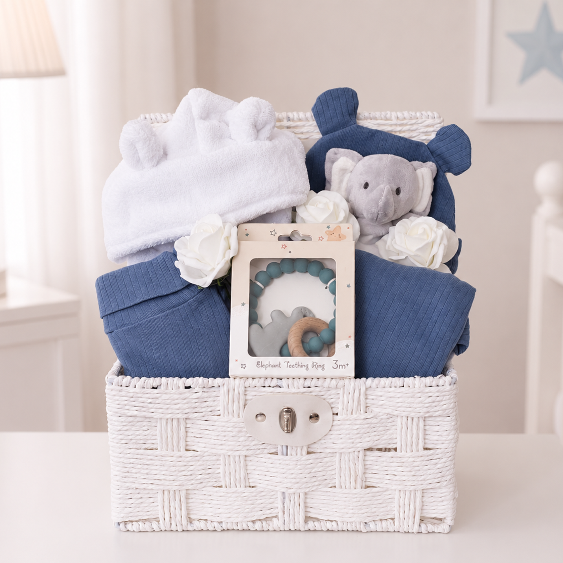 Luxury baby boy gift hamper with organic cotton baby clothes by Ema and Boo.