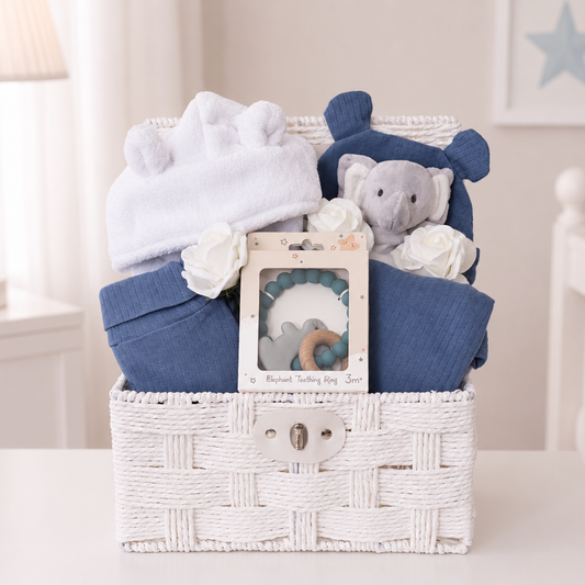 Luxury baby boy gift hamper with organic cotton baby clothes by Ema and Boo.