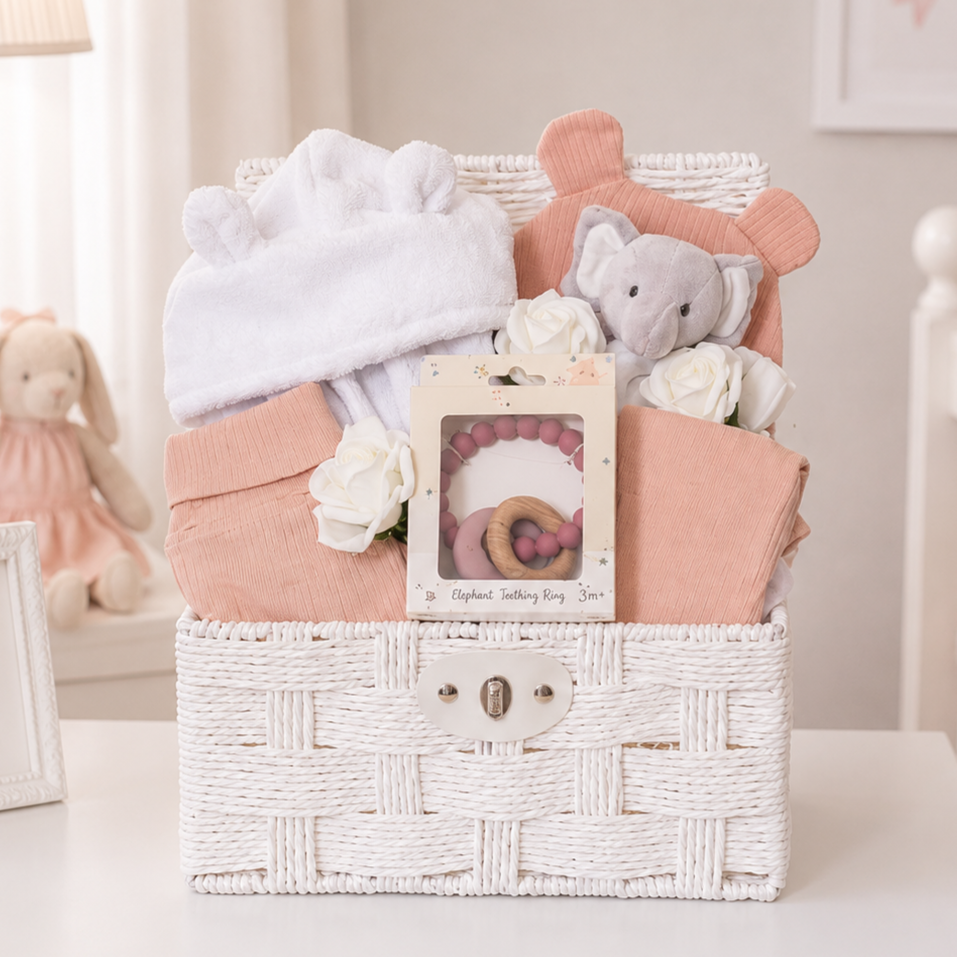 Luxury baby girl gift hamper with organic cotton baby clothes by Ema and Boo.