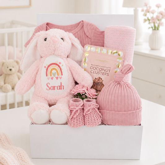 Little Bunny personalised baby girl hamper with pink bunny, cotton outfit, cellular blanket, knitted booties and coconut clusters for Mum