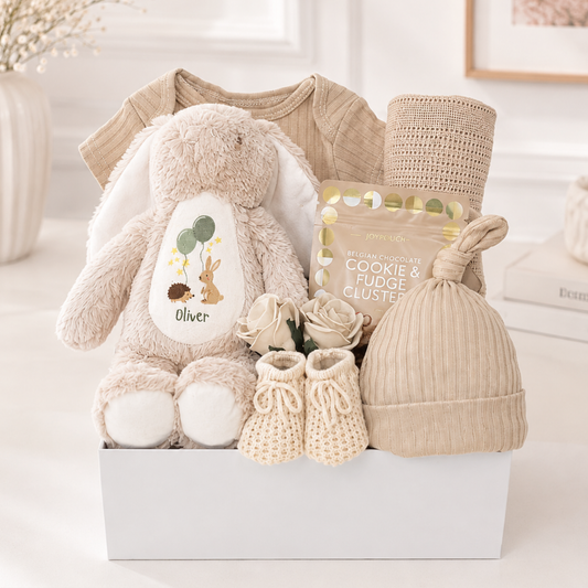Little Woodland Bunny personalised neutral baby hamper with beige bunny, coffee baby outfit, stroller blanket, knitted booties and chocolates for Mum