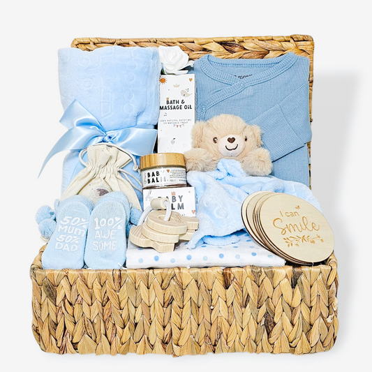 Little Hug baby boy gift hamper with blue plush blanket, bear comforter, sleepsuit, milestone discs and baby essentials