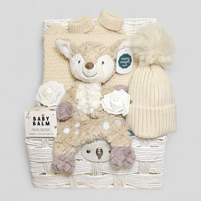 Neutral baby hamper with pom pom blanket, hat, booties, baby balm & Mary Meyer fawn soft toy