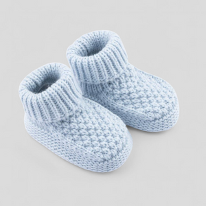 Pair of blue knitted baby booties 