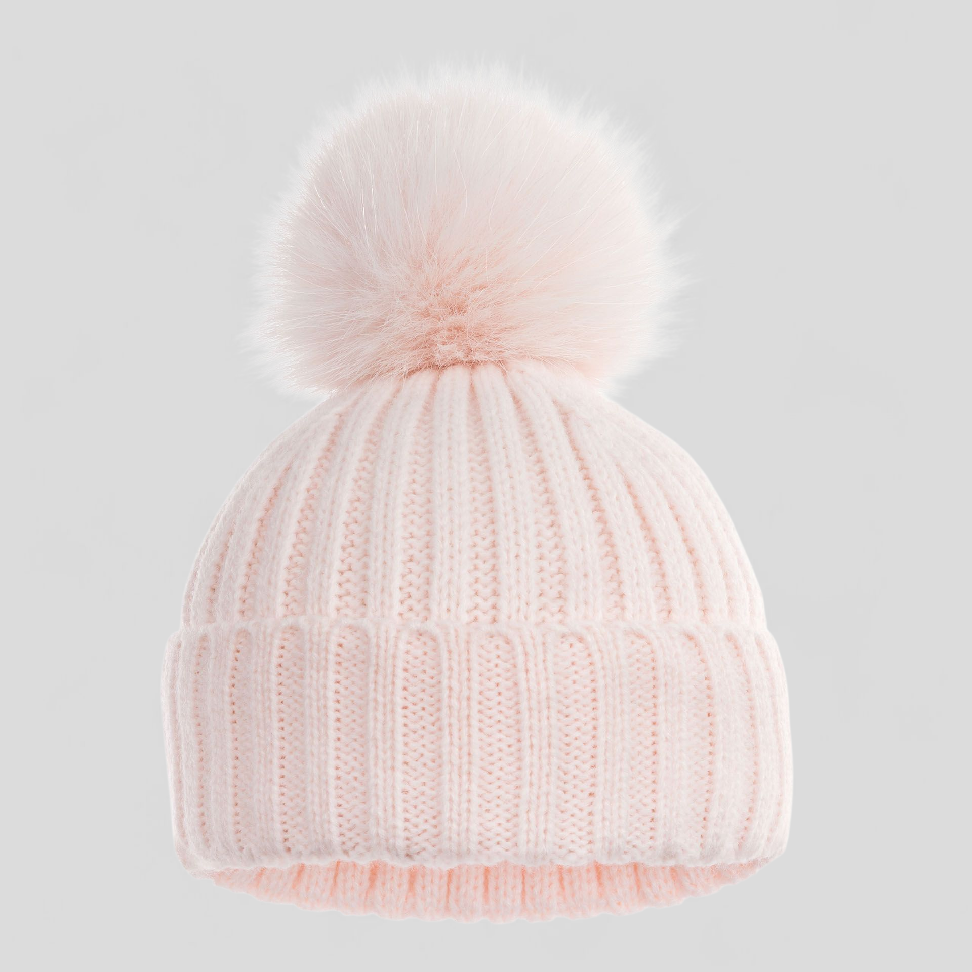 Pink knit baby beanie with a pom-pom 