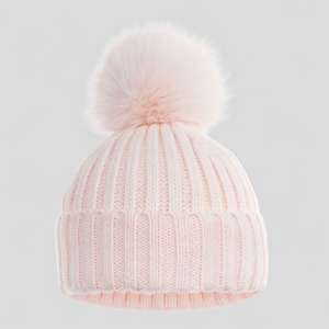 Pink knit baby beanie with a pom-pom 
