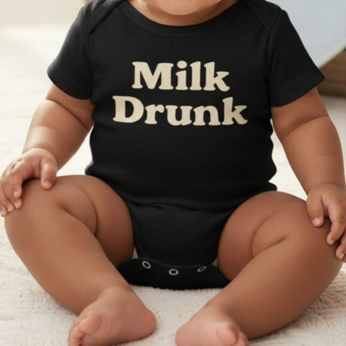 Black Milk Drunk baby bodysuit with off-white writing