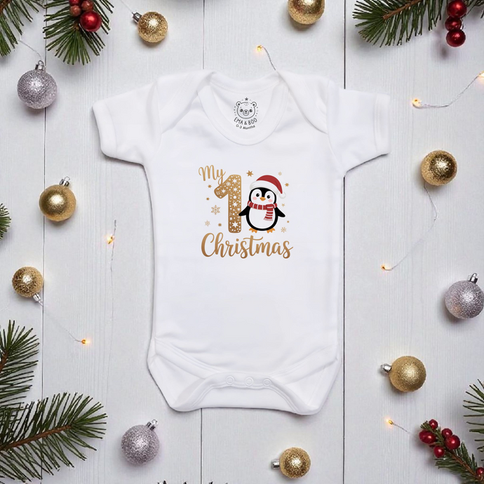 White baby bodysuit with penguin and “My 1st Christmas” gold print – festive baby Christmas outfit