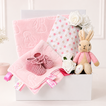 Baby girl gift box with Flopsy Bunny, pink blankets and knitted booties.