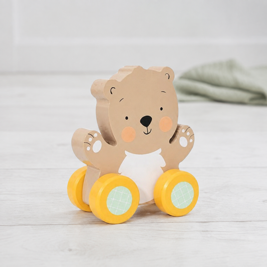 First Steps wooden bear push along toy with yellow wheels for babies aged 12 months plus
