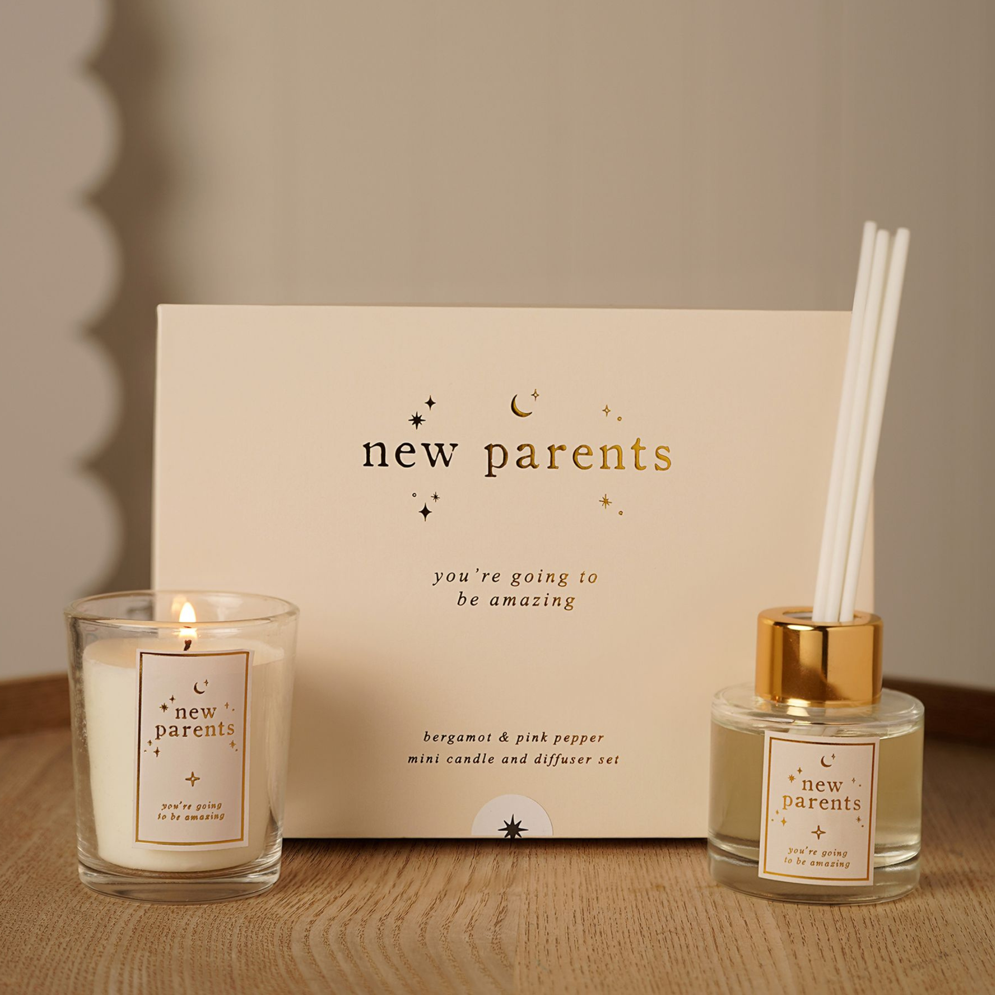 Luxury new parents Bergamot & Pink Pepper candle and reed diffuser gift set in a premium presentation box.