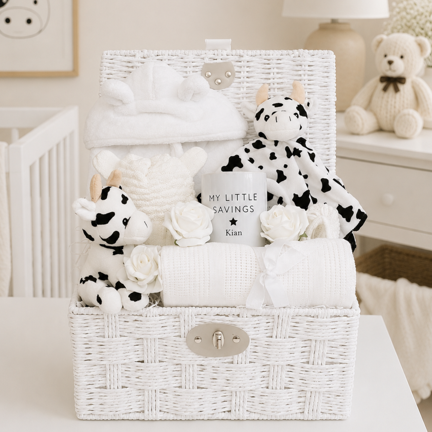 Personalised unisex baby hamper with cow comforter, money box and baby essentials