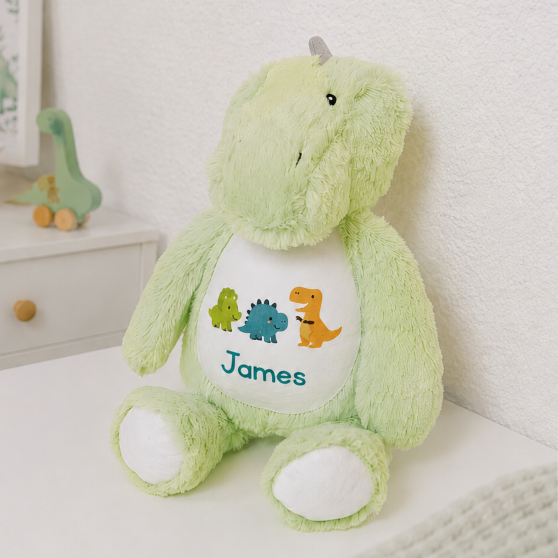 Soft green personalised dinosaur plush toy – baby gift and keepsake