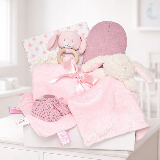 Pink bunny baby girl gift box with newborn essentials