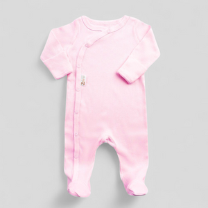 Light pink ribbed newborn sleepsuit with front poppers
