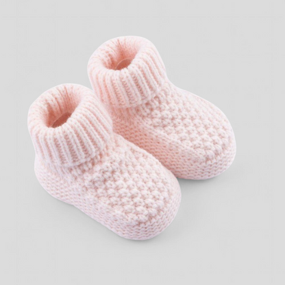 Pair of pink knitted baby booties