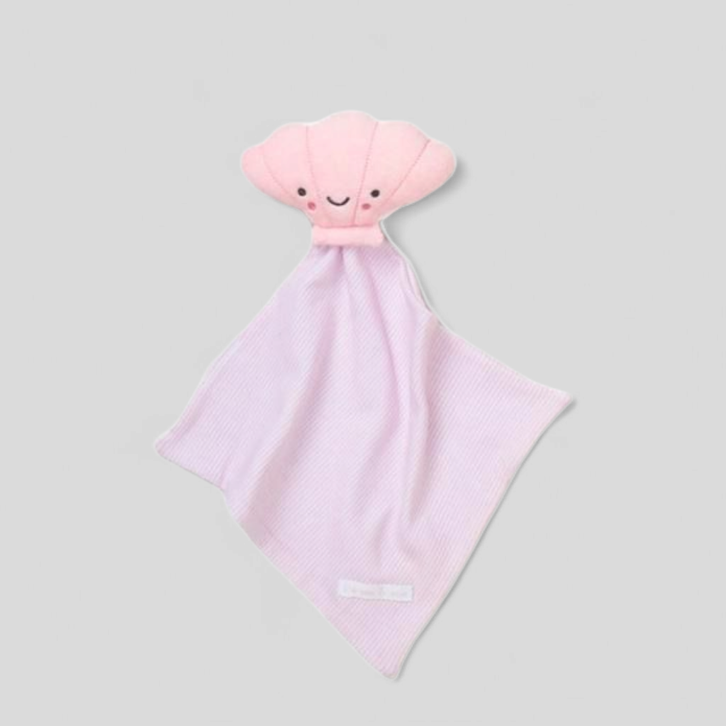 Pink plush toy comforter, seashell with a smiling face 