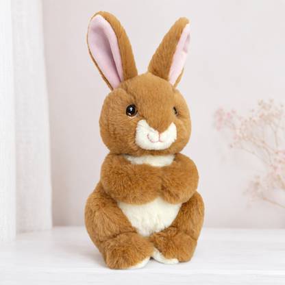 A brown plush bunny toy with pink inner ears - Baby girl hamper gift
