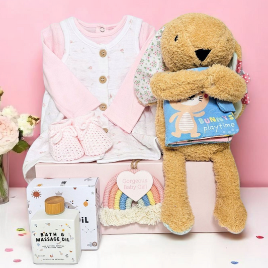 Rainbow Wishes baby girl hamper – baby gift set with outfit, plush bunny, sensory book, bath oil and rainbow decoration

