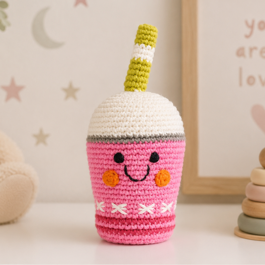 Strawberry milkshake baby rattle – handmade crochet play food toy by Pebble, fair trade and newborn safe