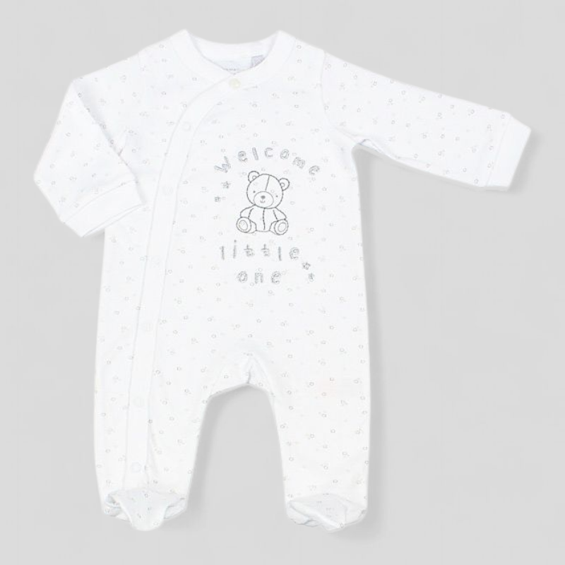 White baby sleepsuit with star pattern and embroidered Welcome little one and teddy bear 